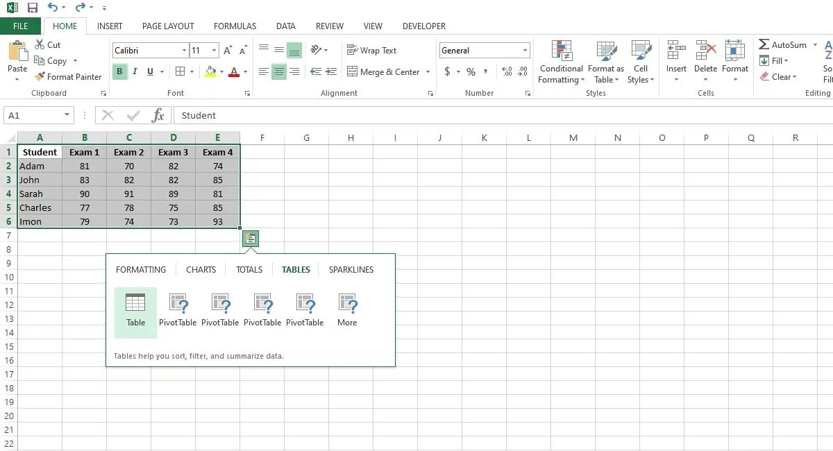select cells to convert into table using quick analysis tool